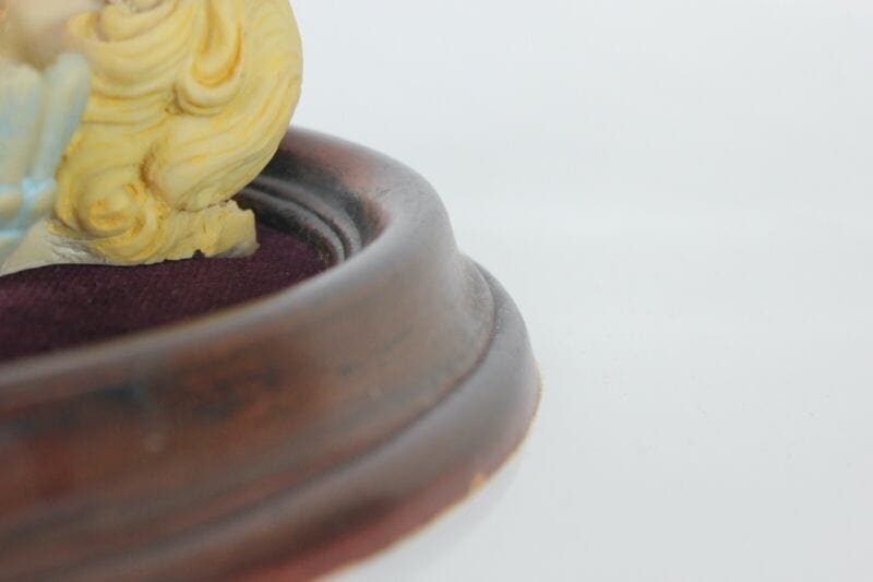 Angelo decorativo stile antico putto da parete con cornice ovale cherubino Quadri