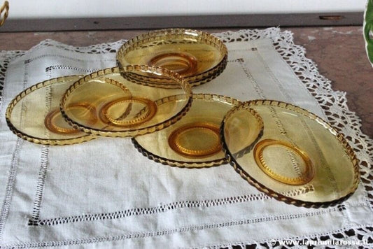SET DI SEI PIATTINI D'EPOCA IN VETRO GIALLO AMBRA SIX VINTAGE AMBER GLASS PLATES Vetri e Cristalli