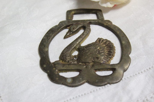 ANTICO FINIMENTO PER CAVALLO IN OTTONE CON CIGNO VINTAGE BRASS SWAN 900 Categoria  Finimenti per cavalli