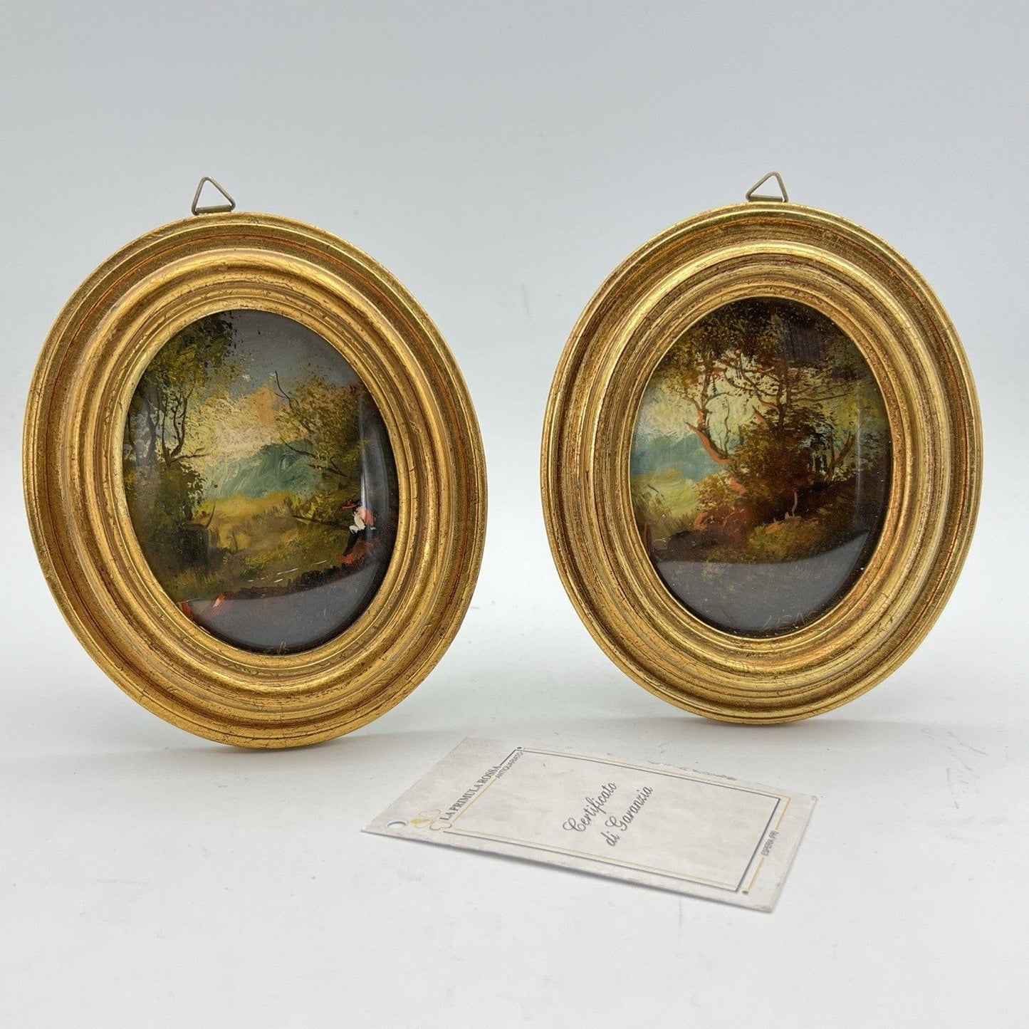 Coppia quadretti antichi miniature ovali dipinti paesaggio cornici legno dorato Categoria  Quadri