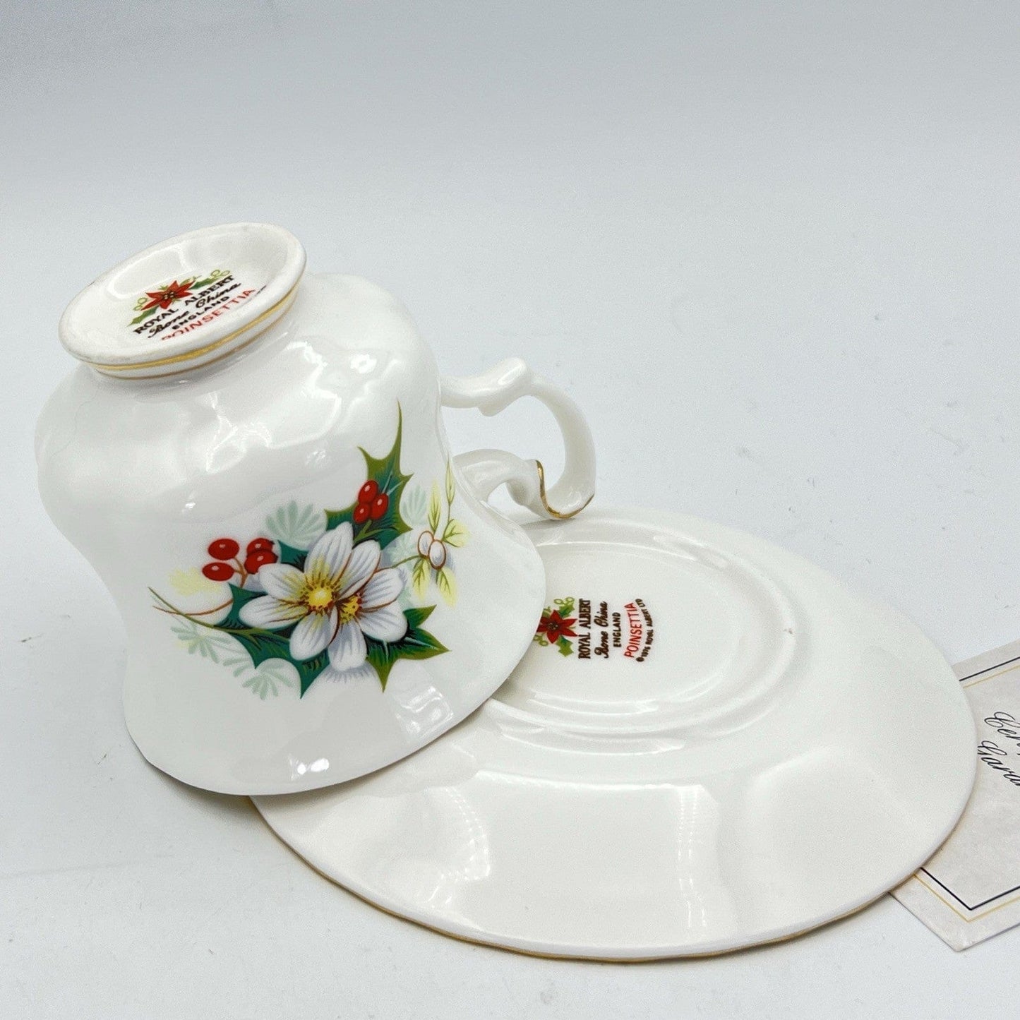 Tazza in porcellana Royal Albert tazzina da caffè inglese Natale Poinsettia 1976 Categoria  Servizio tazze - Tazze